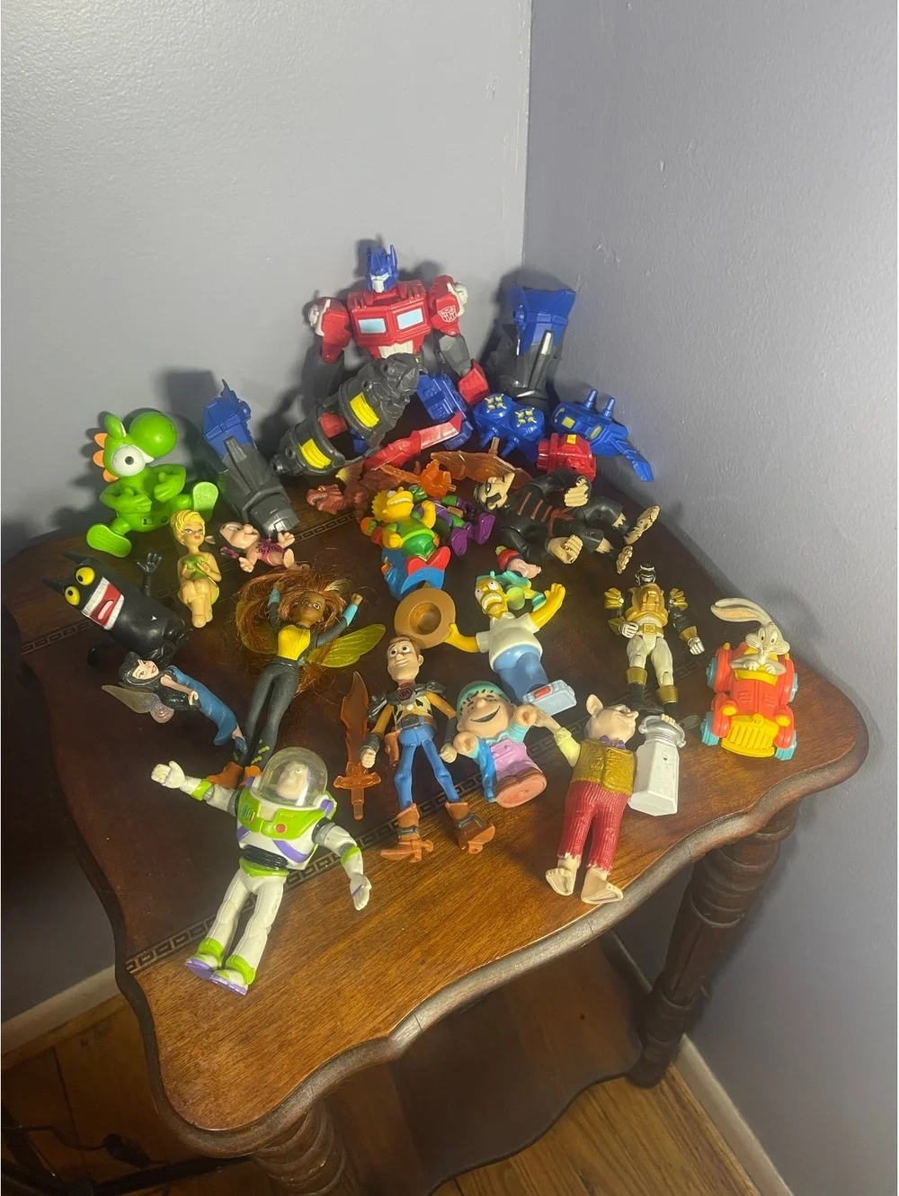 Mixed Lot of Vintage and Modern Action Figures Including Transformers, Simpsons,